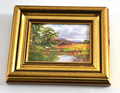 Lot 338 - F Clark, porcelain plaque with cows