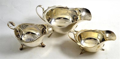 Lot 341 - Three silver sauce boats