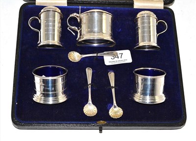 Lot 347 - A five piece silver cruet set, London 1911, in a fitted case