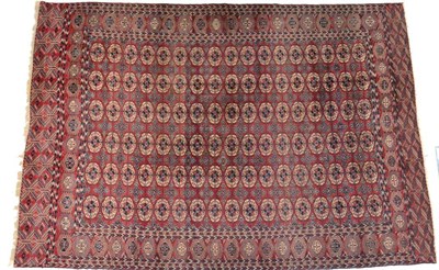 Lot 760 - Tekke Carpet Emirate of Bukhara, circa 1900 The madder field with six columns of quartered...