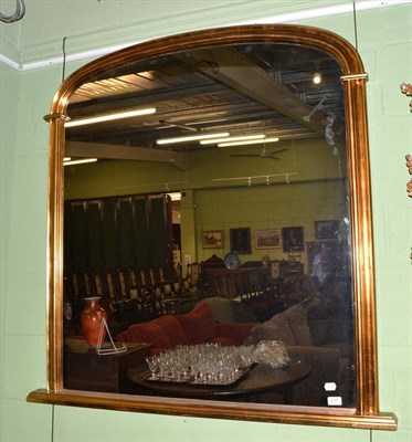 Lot 412 - A modern gilt framed overmantel wall mirror