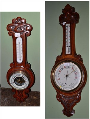 Lot 413 - An Edwardian oak barometer and another small barometer