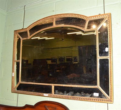 Lot 420 - A rectangular wall mirror with small plates