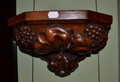 Lot 430 - A carved oak bracket