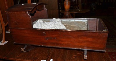 Lot 438 - A pine cradle and tin liner