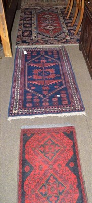 Lot 444 - Bergama rug, West Anatolia, the deep indigo field with stepped medallions framed by spandrels...