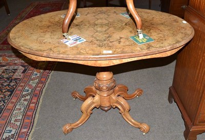 Lot 452 - A Victorian burr walnut veneered inlaid oval table