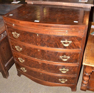 Lot 454 - Walnut and cross banded bow front bachelor's chest