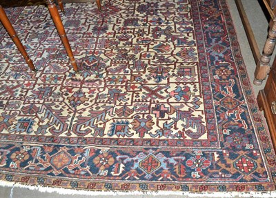 Lot 469 - Heriz carpet, Persian Azerbaijan, the ivory field of angular vines around a latch hook...