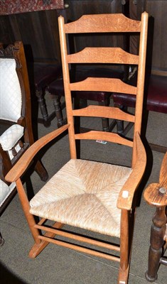 Lot 479 - Shaker style light oak rocking chair