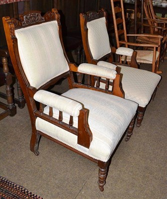 Lot 480 - Late Victorian open armchair and another similar with cream upholstery