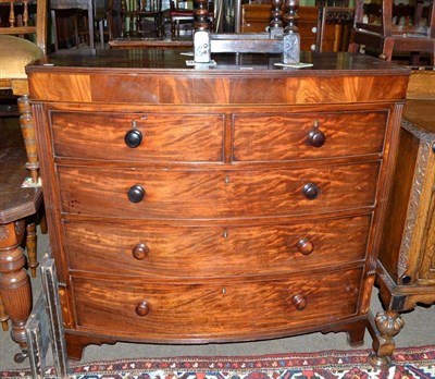 Lot 508 - A 19th century mahogany bow front four height chest of drawers