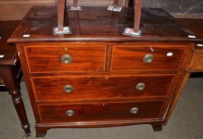 Lot 517 - A late Victorian mahogany inlaid three height chest of drawers