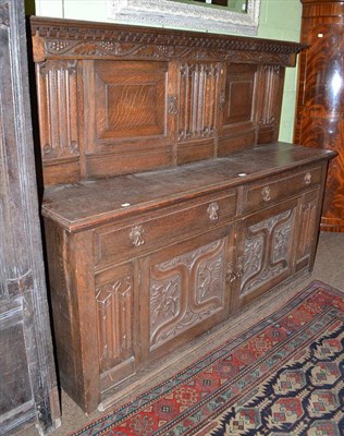 Lot 540 - Large carved oak buffet