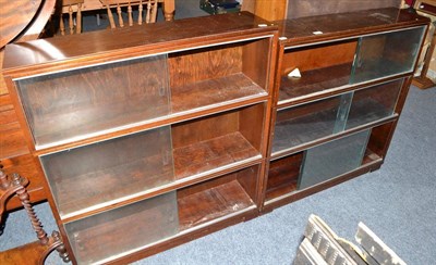 Lot 583 - Three height stacking bookcase with sliding glass doors and another similar