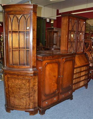 Lot 595 - A reproduction mahogany bureau bookcase, reproduction mahogany TV cabinet and standing corner...