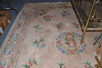 Lot 628 - Chinese carpet, the pale mushroom field with central roundel medallion surrounded by floral...