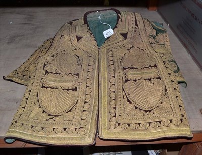 Lot 683 - Four Afghan gilt lace decorated velvet waistcoats