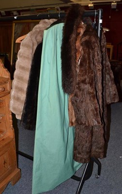 Lot 686 - Astrakhan faux fur jacket, another, three stoles and a squirrel fur coat, and a Jekmoth...