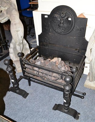 Lot 707 - A reproduction cast iron fire grate with fire back