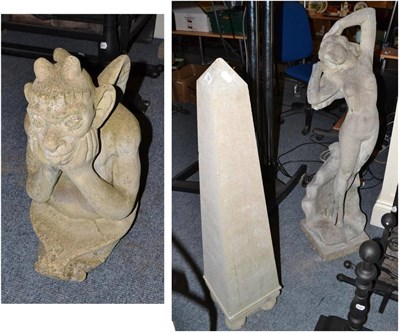 Lot 708 - Modern garden figure of a maiden in a shell, an obelisk and a seated gargoyle