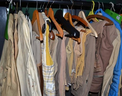 Lot 721 - A quantity of assorted equestrian clothing including breeches, waistcoats, canvas macs, etc