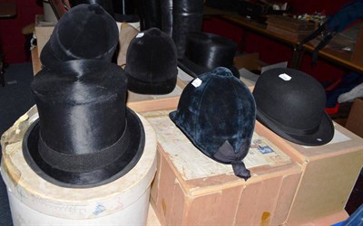 Lot 731 - Lock & Co black silk top hat, another, black bowler hat, two S Patey riding hat and two Herbert...