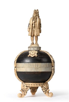 Lot 805 - A French Ivory and Wood Nelson Commemorative, circa 1900, surmounted by a triptych figure of...