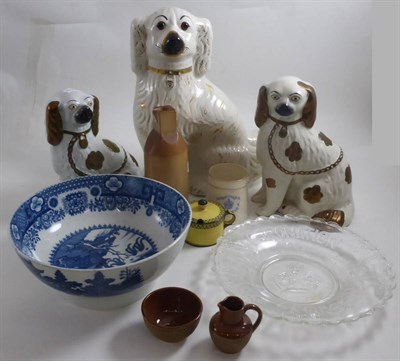 Lot 5 - Three Staffordshire dogs, a blue and white bowl, a mustard pot, 1930s pewter footed bowl,...