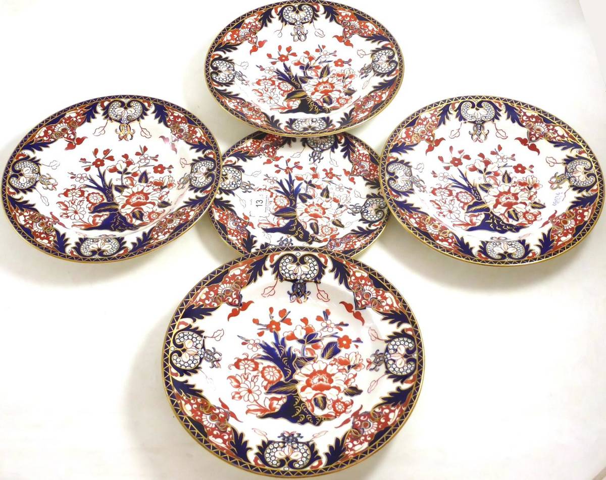 Lot 13 - Four Royal Crown Derby bowls and one plate