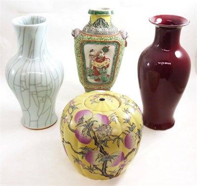 Lot 31 - Two 20th century vases, jar and cover and a hu vase