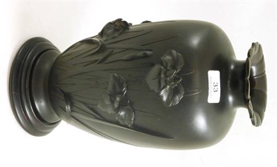 Lot 33 - A Japanese bronze vase, circa 1910, depicting irises in relief