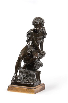 Lot 811 - After Edouard Drouot (French, 1859-1945): A Bronze Figure of a Youth, sitting on a rock, a tortoise