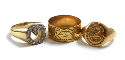 Lot 67 - Three gentleman's gold rings including an 18ct gold signet ring, a 14ct gold diamond set ring...