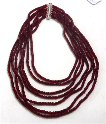 Lot 69 - A seven strand red stone necklace