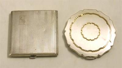 Lot 77 - A silver compact, together with a modern white metal compact (2)