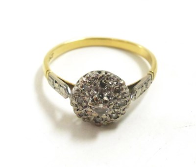 Lot 88 - A diamond cluster ring stamped '18CT'