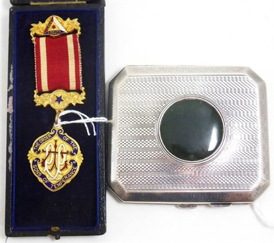 Lot 102 - Silver cigarette case with nephrite inlay and a Masonic enamel medal in fitted case (2)