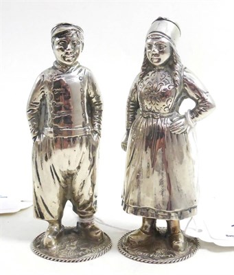 Lot 110 - Pair of Dutch white metal pepperettes, inscribed Volendam and Marken