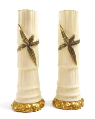 Lot 113 - A pair of Royal Worcester bamboo specimen vases