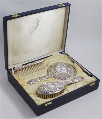 Lot 127 - A four piece silver dressing brush set, Birmingham 1992, by S & Co