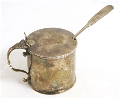 Lot 134 - George III silver mustard, London 1784 and a mustard spoon
