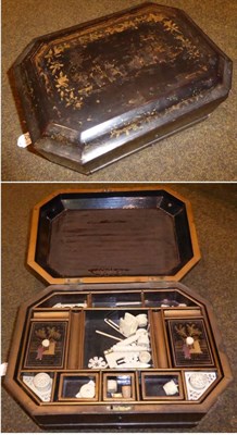 Lot 144 - A Japanese Meiji period lacquered workbox containing ivory implements (a.f.)