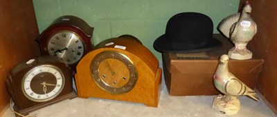 Lot 155 - Four mantel clocks, two ceramic figures of pigeons and a bowler hat