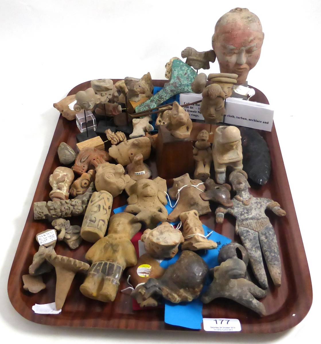 Lot 177 - A group of pre-Columbian terracotta heads, figures, etc including Colima flat female figure,...