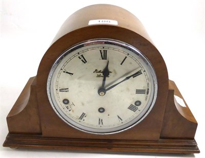 Lot 188 - A walnut veneered mantel clock