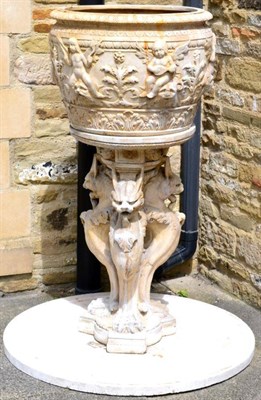 Lot 830 - A Terracotta Garden Urn, in Renaissance style, of ovoid form cast with putti, foliage and...