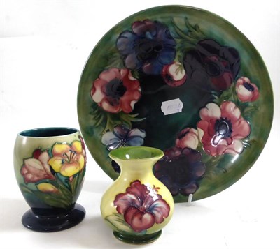 Lot 198 - Three pieces of Moorcroft comprising an Anemone bowl, a Spring Flowers vase and a Hibiscus vase