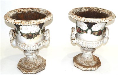 Lot 832 - A Pair of Cast Iron Campana Urns, 19th century, with gadroon border hung with fruit swags...