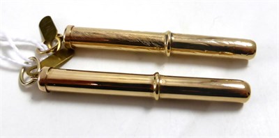 Lot 217 - A 9ct gold toothpick and another